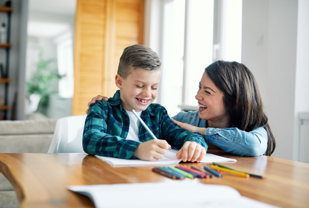 Family First VA psychological testing image: mother and son with homework