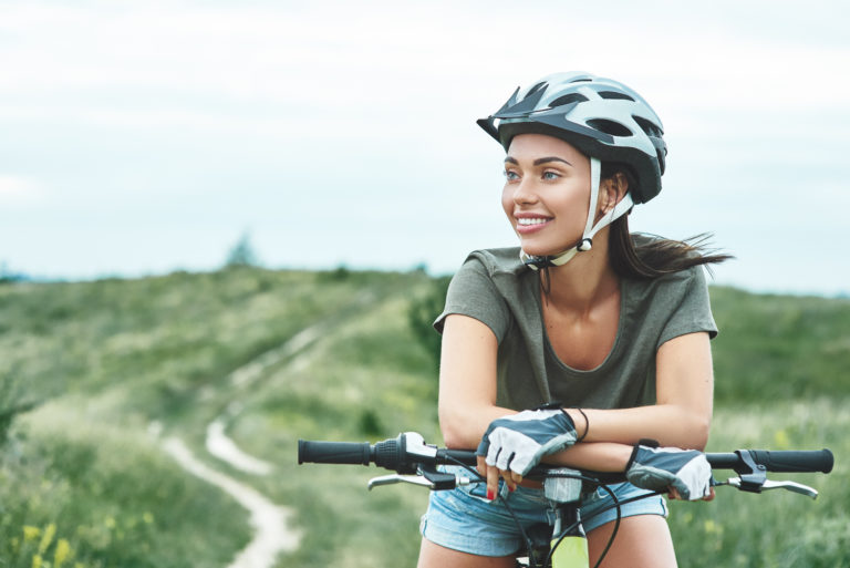 young adult therapy image, woman mountain biking